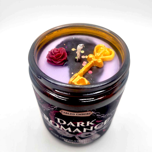 Dark Romance Candle decorated with wax melts and biodegradable glitter. 9oz coconut soy wax candle.