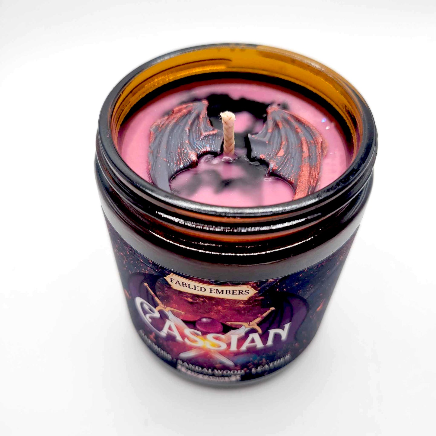 CASSIAN candle with colored wax and wax melt wings decoration