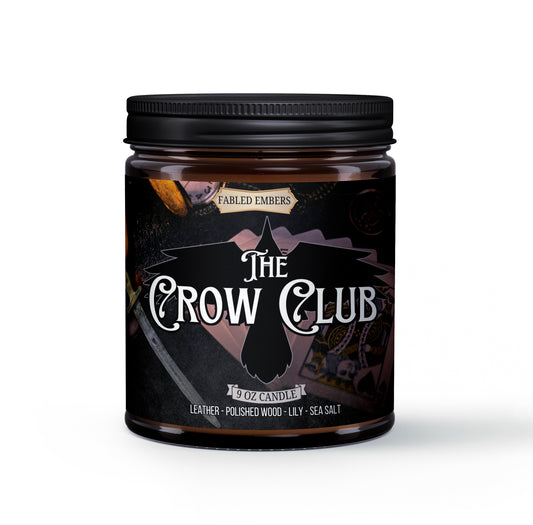 The Crow Club Ketterdam's den of thieves smells like leather and polished wood with notes of sea salt and amber. Inspired by 6 of Crows Amber Glass Jar Candle 9oz