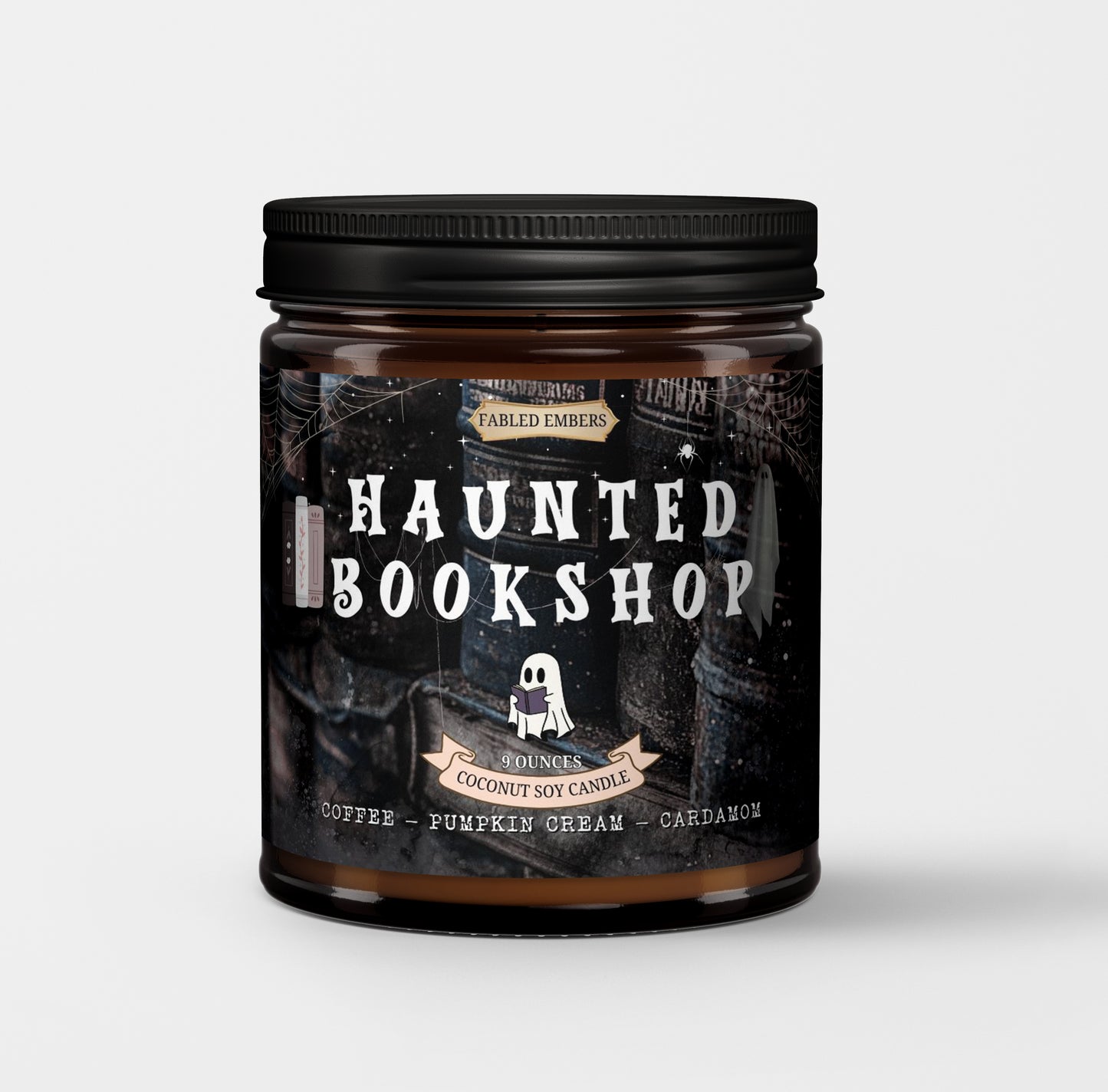 Candle jar labeled 'Haunted Bookshop' with a black lid on a light gray background