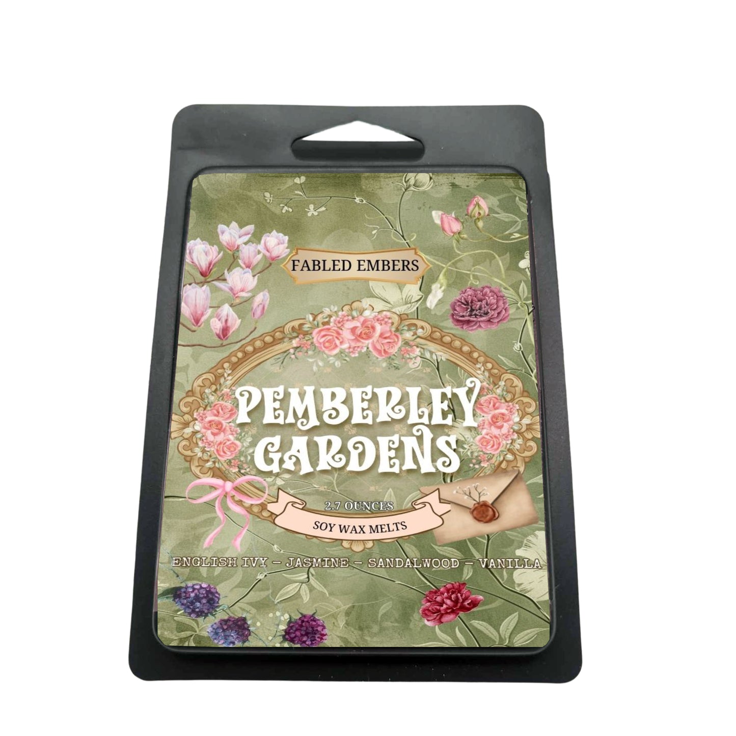Matte Black Clamshell wax melts with a green label featuring an ornate gold frame, pink roses, green foliage, and a small sealed letter with a pink ribbon. The candle is named "Pemberley Gardens" and has scent notes of English Ivy, Jasmine, Sandalwood, and Vanilla.