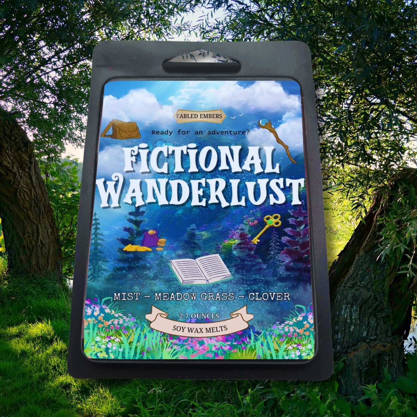 Fictional Wanderlust product packaging with nature-themed design on a grassy background
