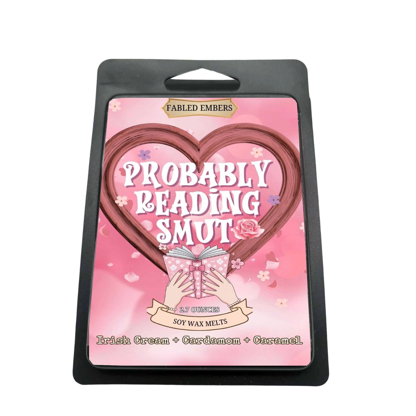 Indulge your passions with our "Probably Reading Smut" soy wax melts! Its playful label features a heart-shaped design framing the cheeky title, with hands holding an open book. Scented with Irish Cream, Cardamom, and Caramel, it's perfect for your next steamy read.