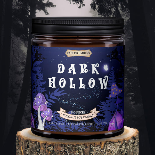 The Dark Hollow dark cozy cottagecore candle smells like grape vines and woods 9 oz amber glass jar