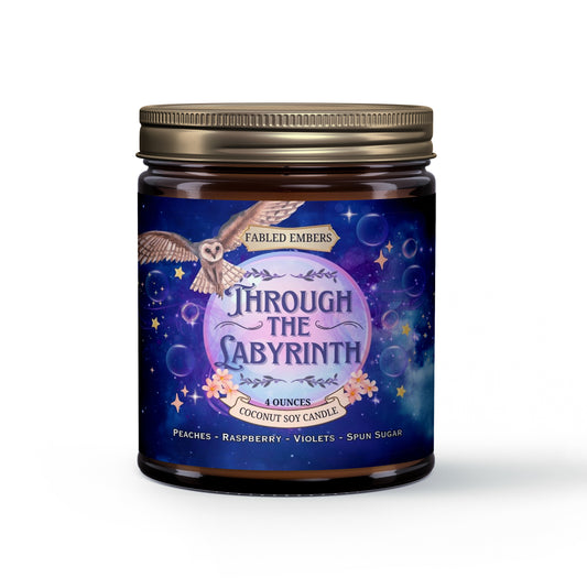 Get lost in a world of enchantment with our "Through the Labyrinth" coconut soy candle. The captivating label features a whimsical owl soaring over a starry, swirling galaxy, with delicate floral accents. Scented with a dreamy blend of peaches, raspberry, violets, and spun sugar, it's perfect for escaping into your favorite fantasy novels.