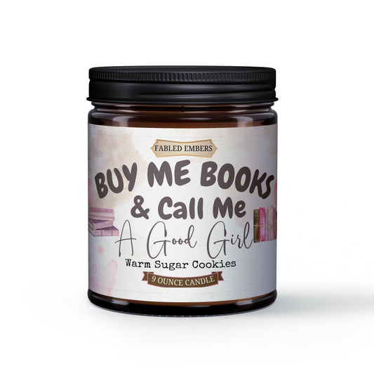 Candle jar with a label reading 'Buy Me Books & Call Me A Good Girl' on a white background