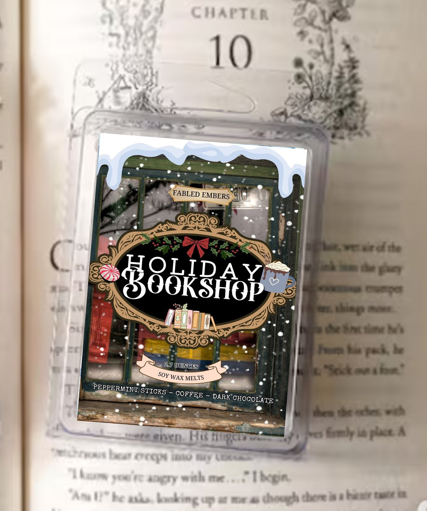 Fragrance wax melt packaging labeled 'Holiday Bookshop' on an open book