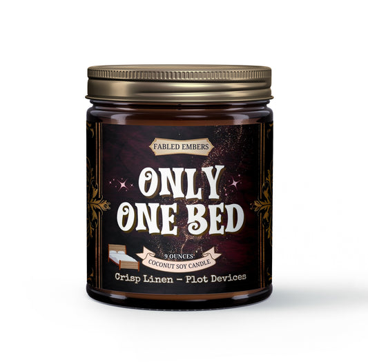 "Only One Bed" coconut soy candle. Because sometimes, forced proximity is the best plot device. Enjoy the fresh crisp linen scent while your favorite characters (or you!) navigate those delightful, inconvenient situations.
