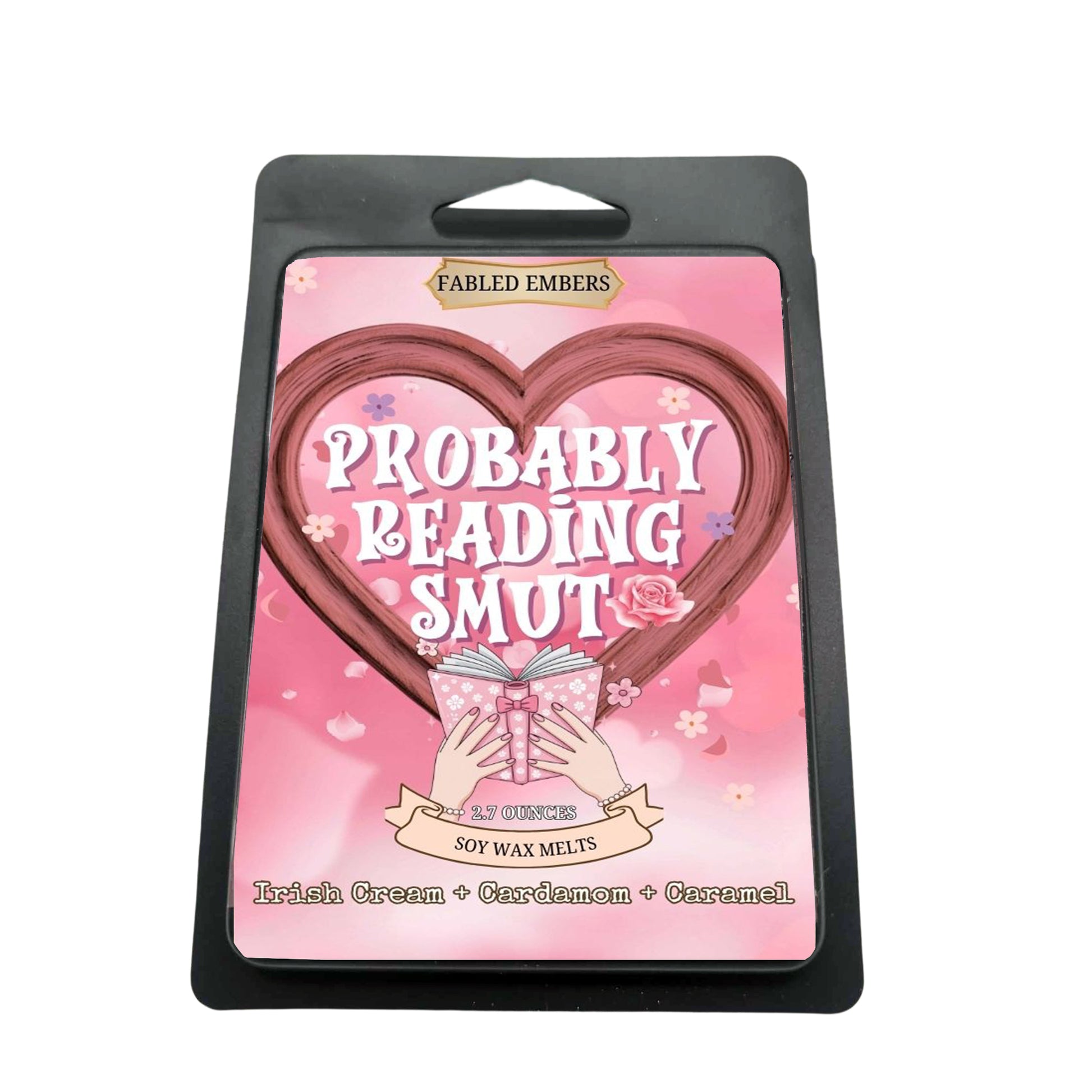 Indulge your passions with our "Probably Reading Smut"  soy wax melts! Its playful label features a heart-shaped design framing the cheeky title, with hands holding an open book. Scented with Irish Cream, Cardamom, and Caramel, it's perfect for your next steamy read.